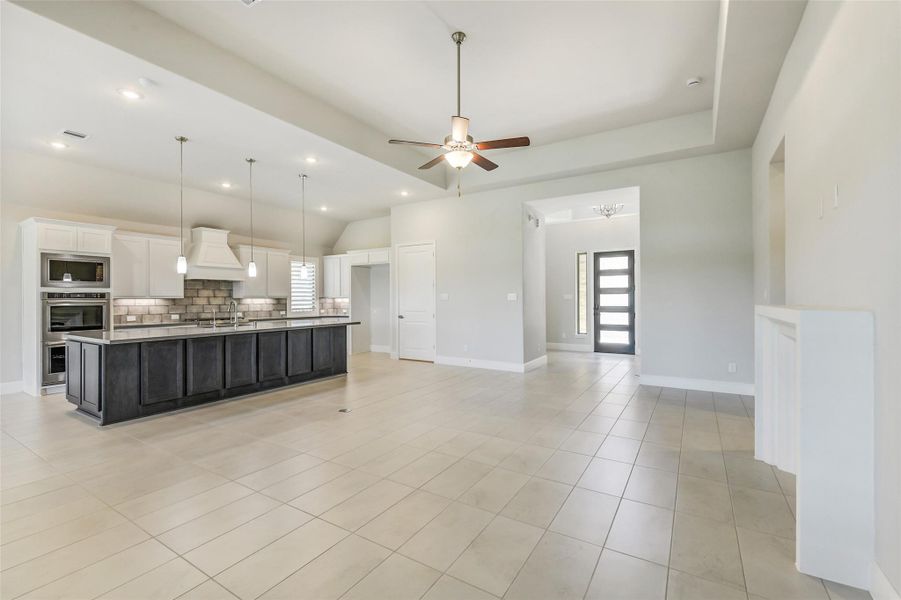 The family room is open to the large 12 x 19 kitchen. The family room is open to the large 12 x 19 kitchen.