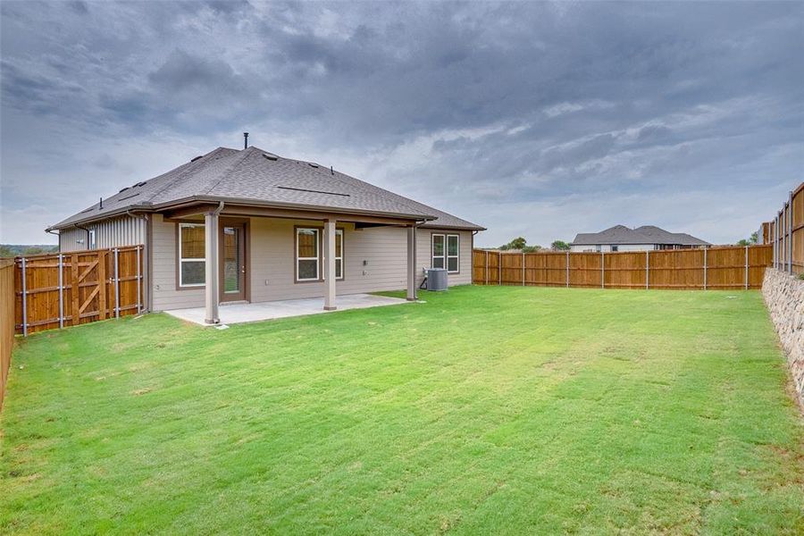 Exterior details and patio area of a home in Sierra Vista at Kelly Ranch, Aledo (Image 16). Exterior details and patio area of a home in Sierra Vista at Kelly Ranch, Aledo (Image 16).