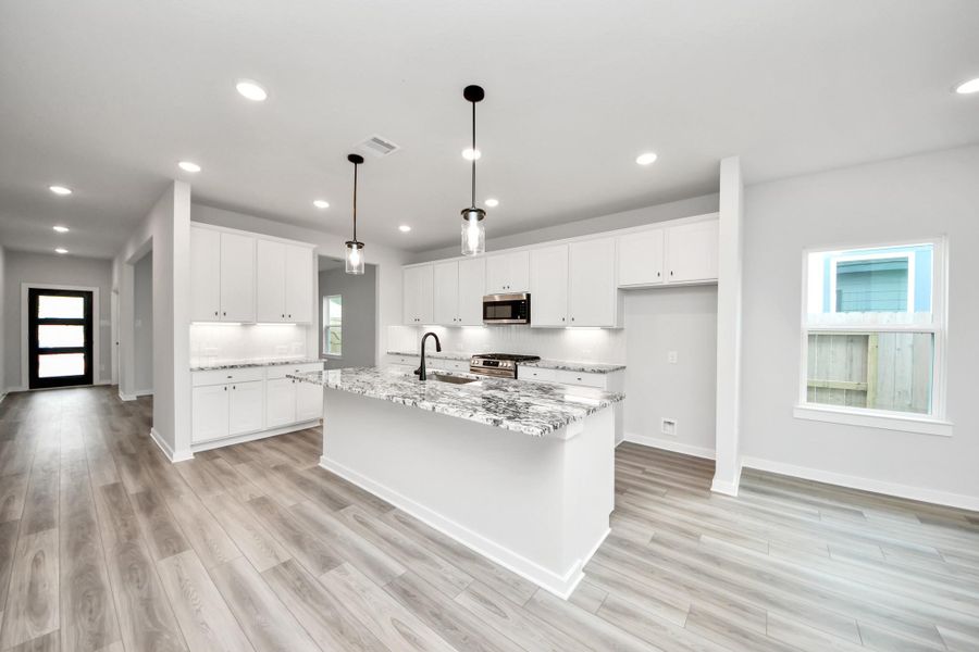 Furnished interior view inside a new home in Sundance Cove, Crosby (Image 9).