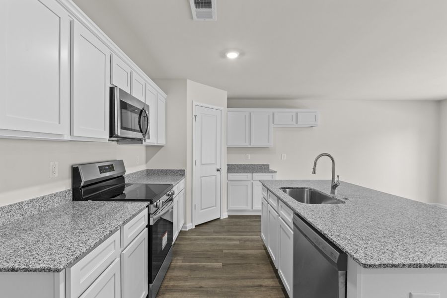 Representative furnished interior of a home built from the Cedar B by McGuinn Homes in Willow Lake, Blythewood (Image 6).