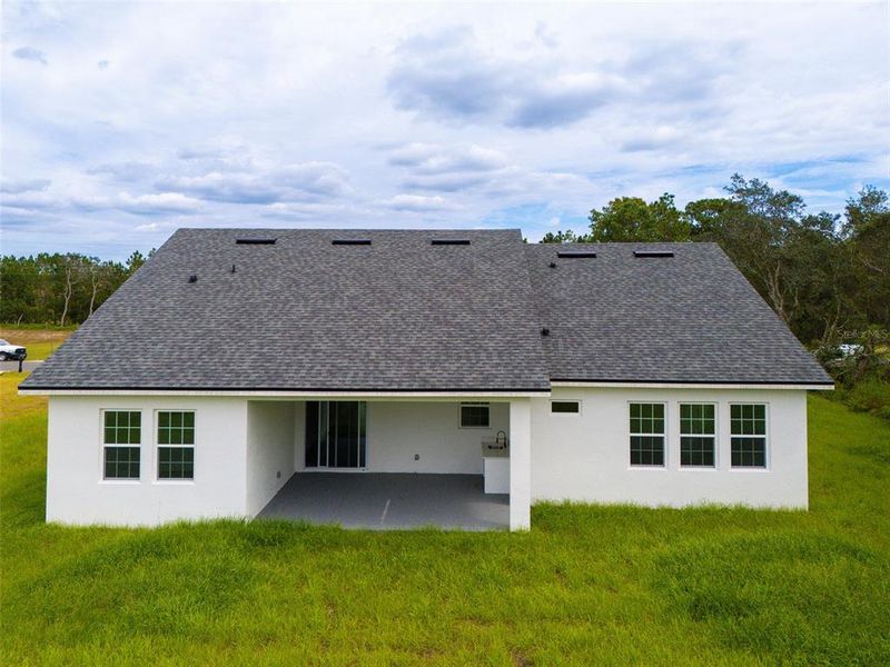 Front exterior of a new home in , Ocala, FL, highlighting curb appeal (Image 19).