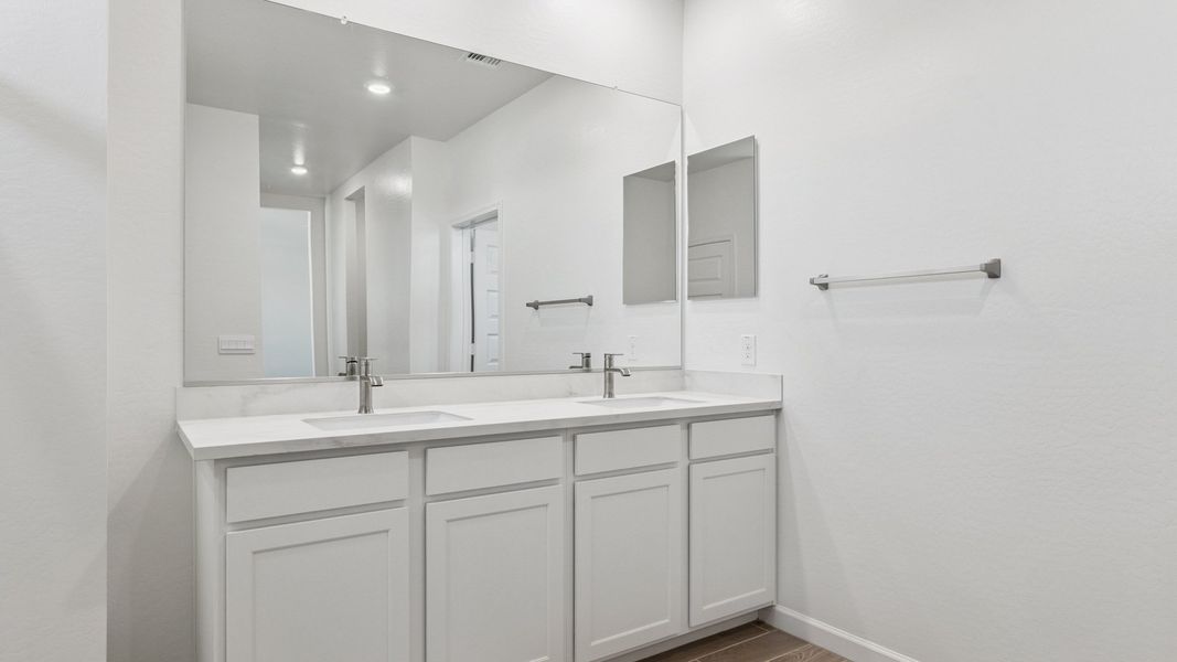 Representative furnished interior of a home built from the Crow by D.R. Horton in Zanjero Pass, Glendale (Image 19).