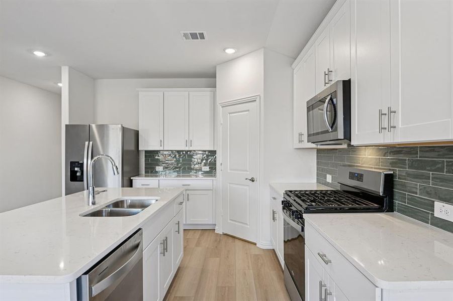 Photo is not of the actual home, but is an inspirational photo of builder’s model home and may depict options, furnishings, and/or decorator features that are not included.