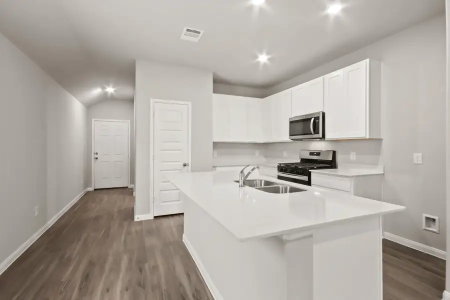 Furnished interior view inside a new home in Ridgeland Hills, Willis (Image 3). Furnished interior view inside a new home in Ridgeland Hills, Willis (Image 3).