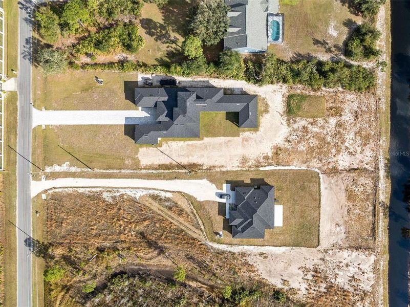 Aerial view of the top of the home. The house to the bottom of it is being sold separately....the ideal multigenerational living opportunity!