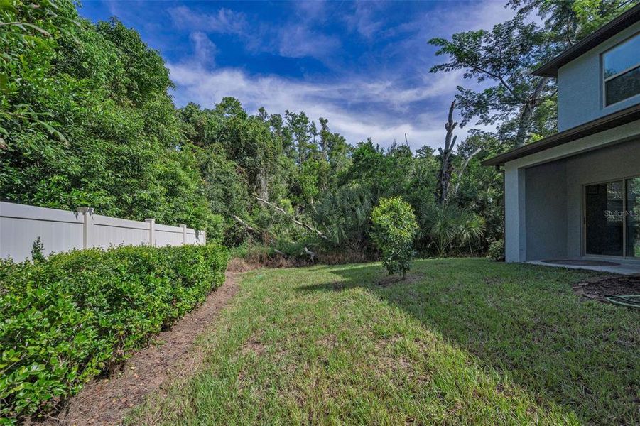 Front exterior of a new home in , Holiday, FL, highlighting curb appeal (Image 1).