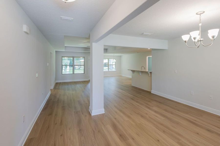 Representative unfurnished interior of a home built from the 2005 by Adams Homes in Parkland Place, Pace (Image 11).