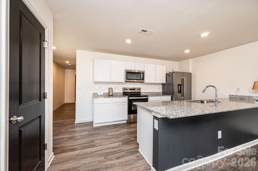 Furnished interior view inside a new home in , Newton (Image 12).