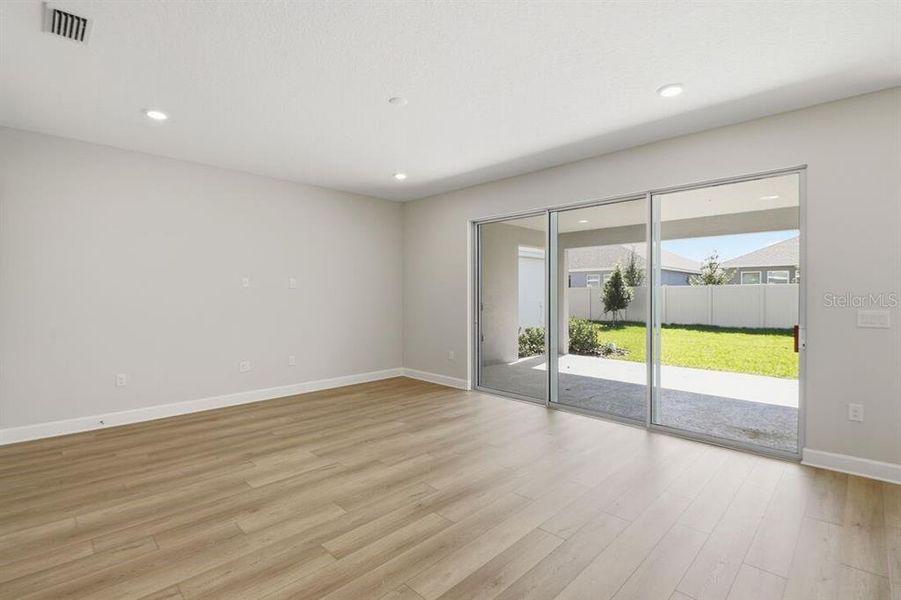 Spacious, unfurnished interior of a new home in Harvest at Ovation, Winter Garden (Image 11).