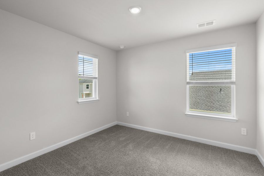 Spacious, unfurnished interior of a new home in Cypress Ridge - The Boardwalk Series, Longs (Image 28).