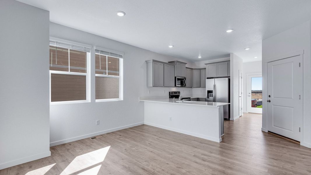 Spacious, unfurnished interior of a new home in Sky Ranch, Watkins (Image 9).