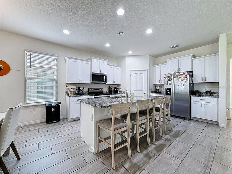 Furnished interior view inside a new home in , Winter Garden (Image 7).