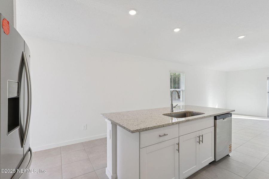 Furnished interior view inside a new home in Flagler Village - Classic Series, Palm Coast (Image 7).