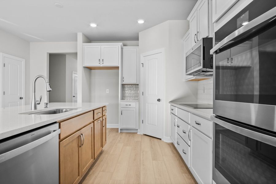 Furnished interior view inside a new home in Coastal Club of the Carolinas, Calabash (Image 5).