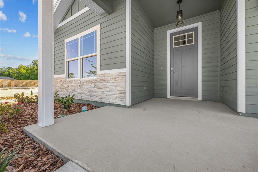 Exterior details and patio area of a home in Grand Oaks, Gainesville (Image 4).