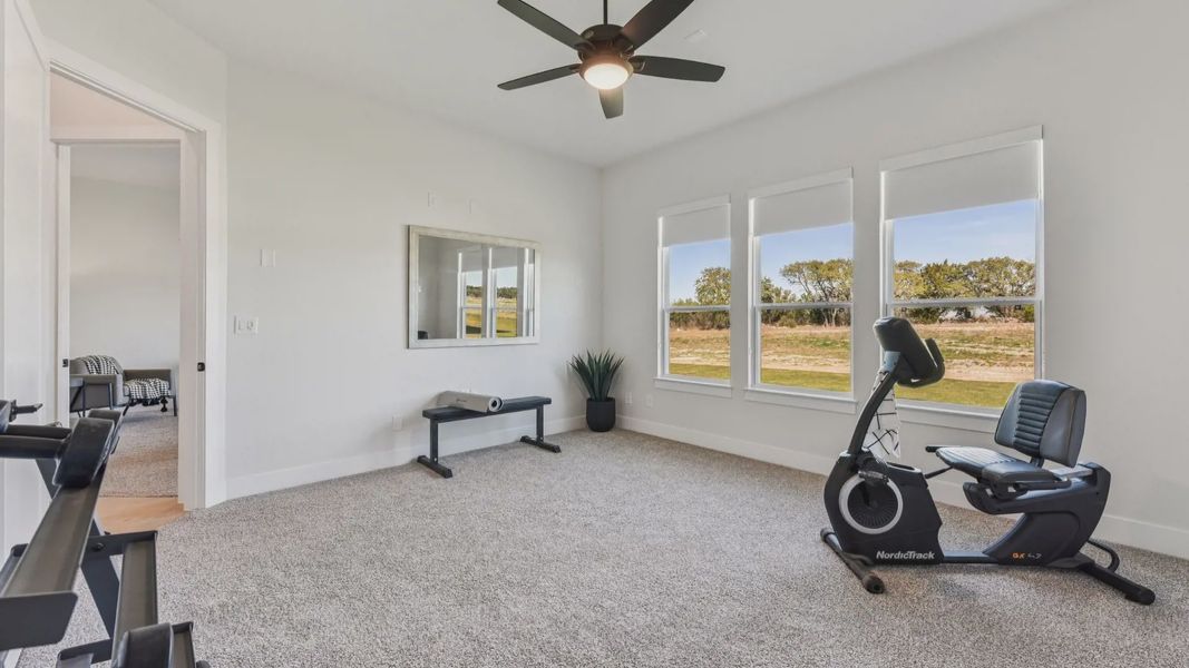 Representative furnished interior of a home built from the Garet by Chesmar Homes in Feathergrass, Florence (Image 28).