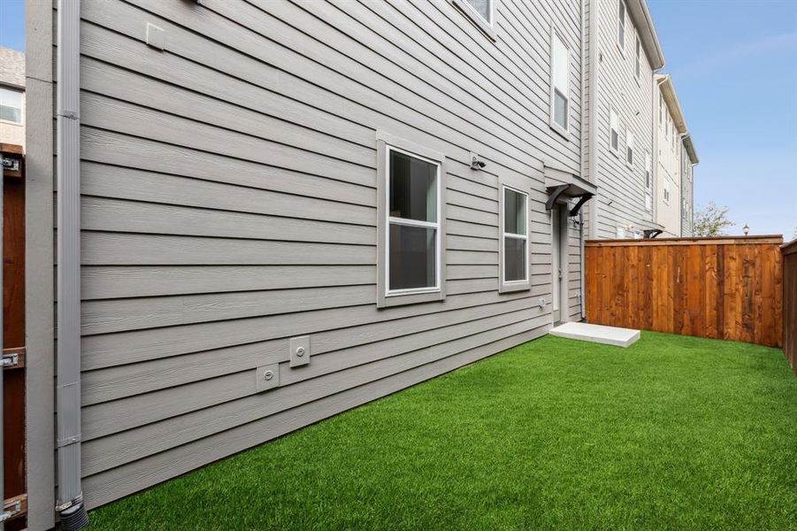 Exterior details and patio area of a home in SoHo Square, Dallas (Image 2). Exterior details and patio area of a home in SoHo Square, Dallas (Image 2).