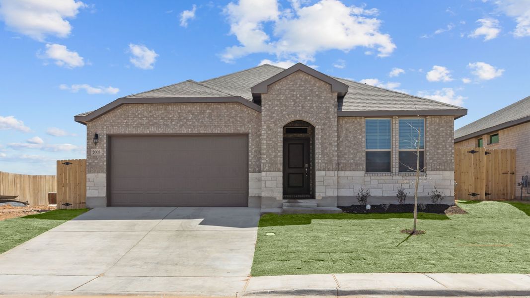 Representative exterior photo of a completed home built from the LAS CRUCES by D.R. Horton in Northwest Passage, Midland, TX (Image 2). Representative exterior photo of a completed home built from the LAS CRUCES by D.R. Horton in Northwest Passage, Midland, TX (Image 2).