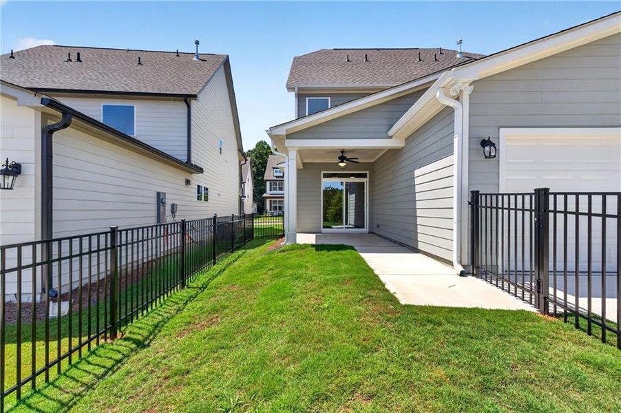 Exterior details and patio area of a home in Marble Tree, Ball Ground (Image 4).