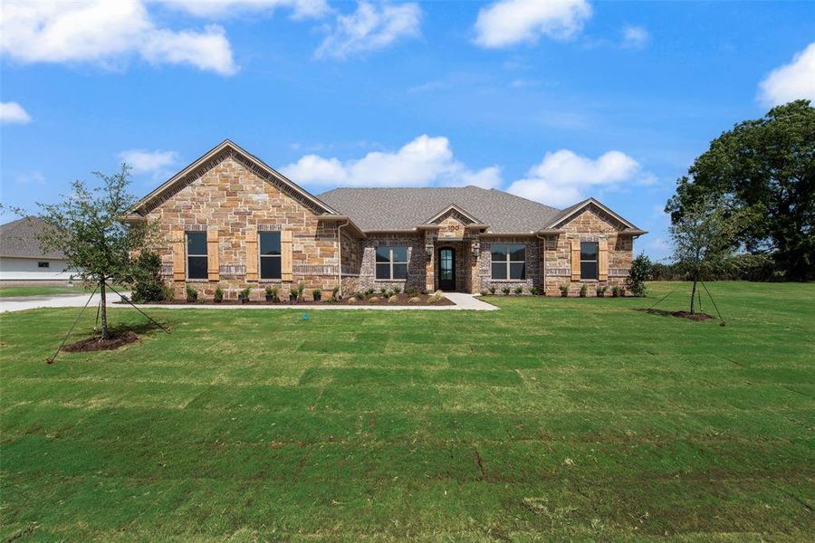 Front exterior of a new home in , Glen Rose, TX, highlighting curb appeal (Image 2). Front exterior of a new home in , Glen Rose, TX, highlighting curb appeal (Image 2).
