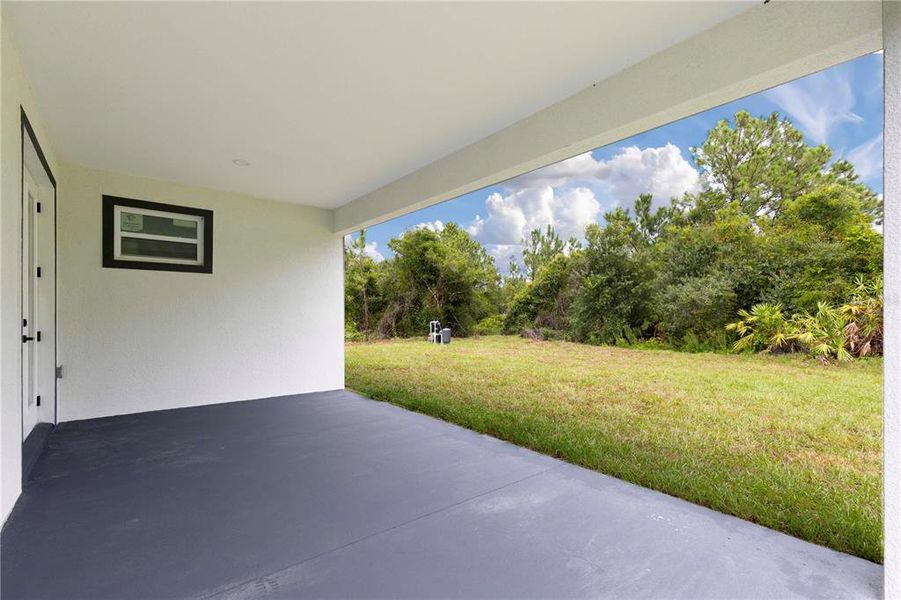 Exterior details and patio area of a home in , North Port (Image 22).