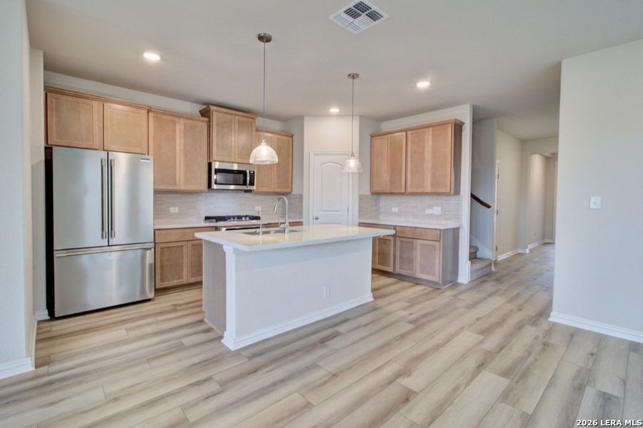 Furnished interior view inside a new home in Stream Waters, Seguin (Image 5).