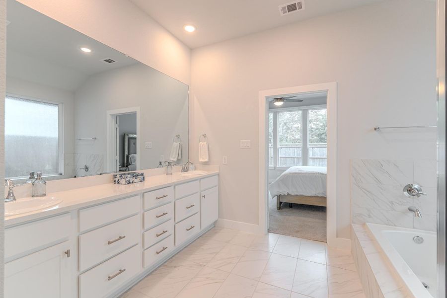 Furnished interior view inside a new home in Grand Central Park, Conroe (Image 31).