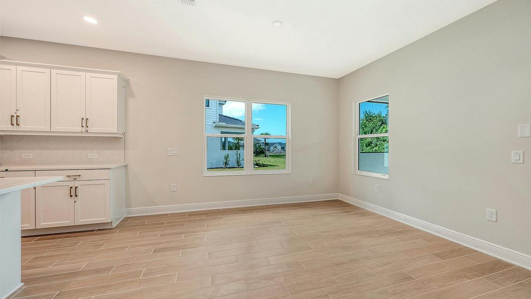 Spacious, unfurnished interior of a new home in Grand Park Real Estate and Homes for Sale in Sarasota, FL - Neal Communities, Sarasota (Image 31).