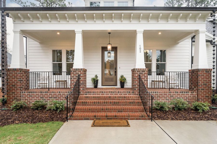 Exterior details and patio area of a home in Hollycrest, Pinehurst (Image 3).