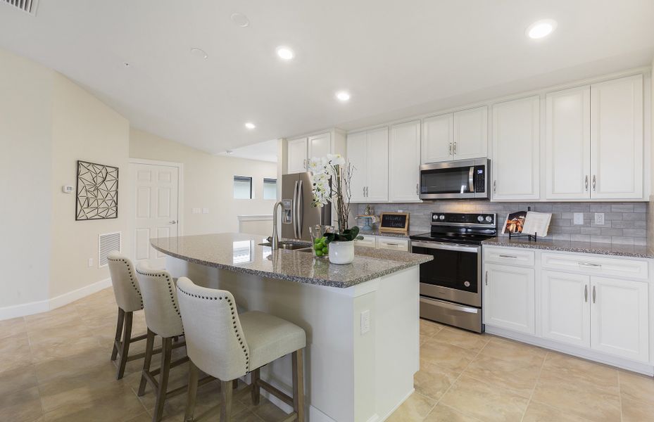 Kitchen with plenty of storage cabinets and center island