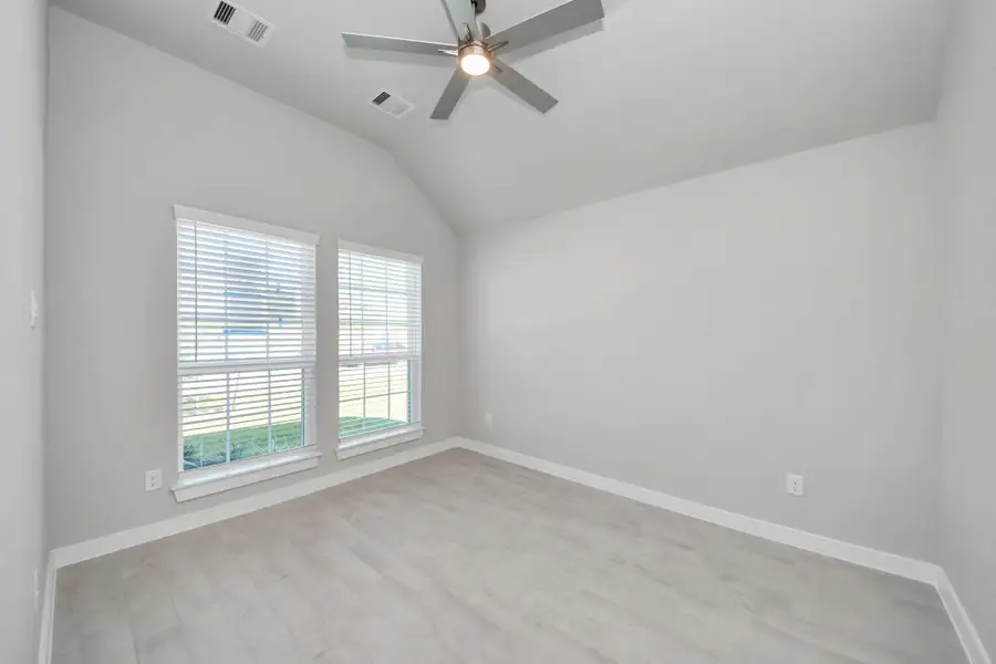 Step into the inviting home office, where elegant tile flooring adds a touch of freshness and comfort to the workspace. Natural light pours through the window, creating an inspiring environment for productivity and focus. Sample photo of completed home with similar floor plan. Actual colors and selections may vary. Step into the inviting home office, where elegant tile flooring adds a touch of freshness and comfort to the workspace. Natural light pours through the window, creating an inspiring environment for productivity and focus. Sample photo of completed home with similar floor plan. Actual colors and selections may vary.
