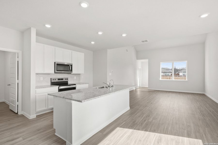 Furnished interior view inside a new home in Abbott Place, St. Hedwig (Image 11).