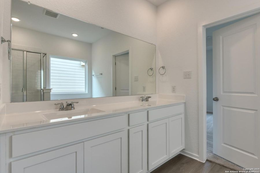 Furnished interior view inside a new home in Meadows at Hennersby Hollow 40's, San Antonio (Image 10).