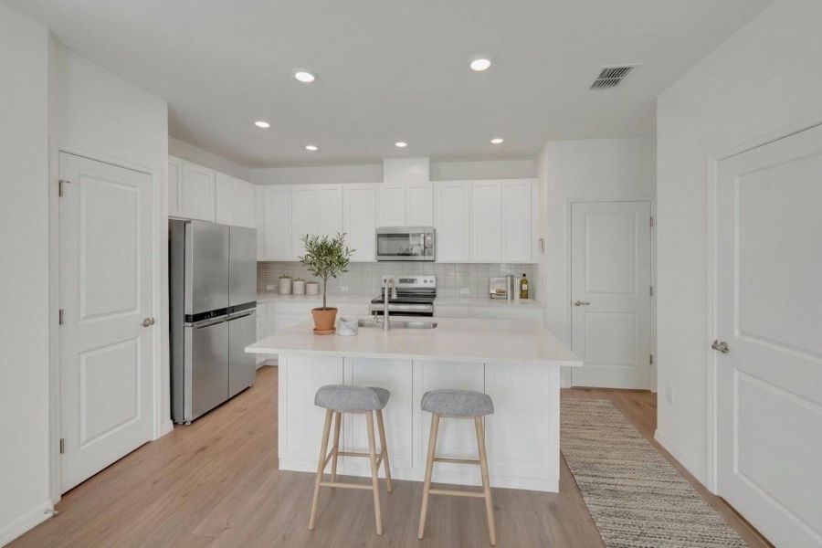 Furnished interior view inside a new home in Waterset Townhomes, Apollo Beach (Image 6).