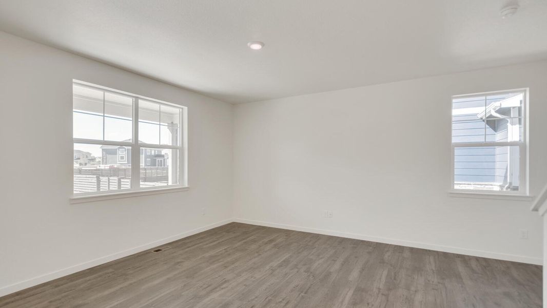 Spacious, unfurnished interior of a new home in The Ridge at Lorson Ranch, Colorado Springs (Image 9).