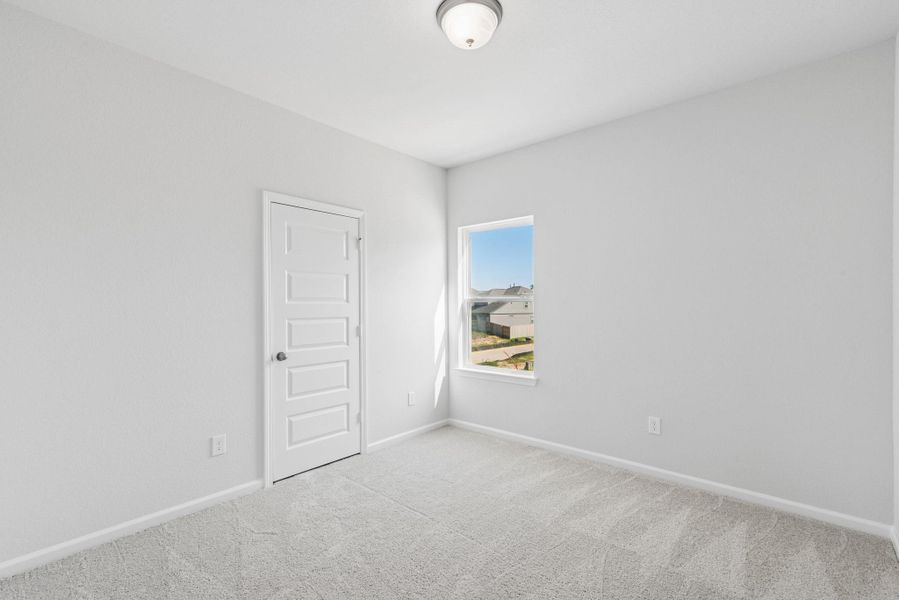 The Sparrow II- Secondary Bedroom 2. Home under construction. Sample floor plan photo used for illustrative purposes only. Upgrades, selections options, windows and colors may vary.