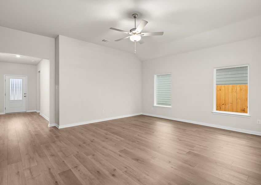 The family room of the Reed is spacious and has large windows. The family room of the Reed is spacious and has large windows.