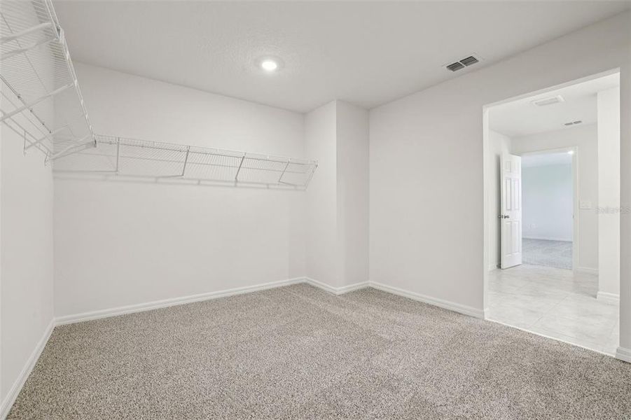 Spacious, unfurnished interior of a new home in Lake Deer Estates - Signature Series, Poinciana (Image 31).