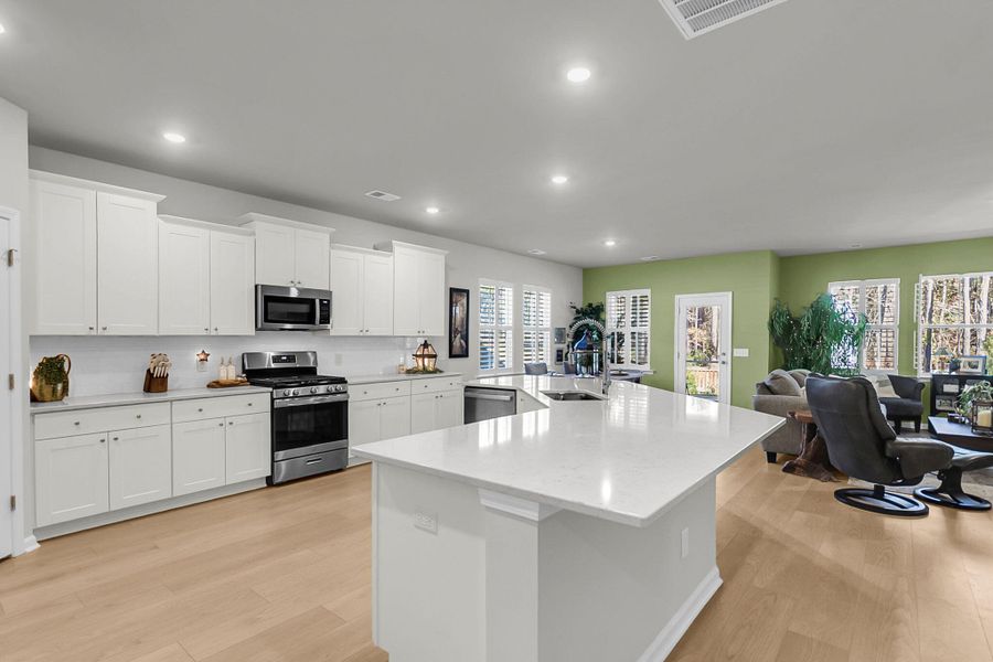 Furnished interior view inside a new home in Sweetgrass at Summers Corner: Arbor Collection, Summerville (Image 13).