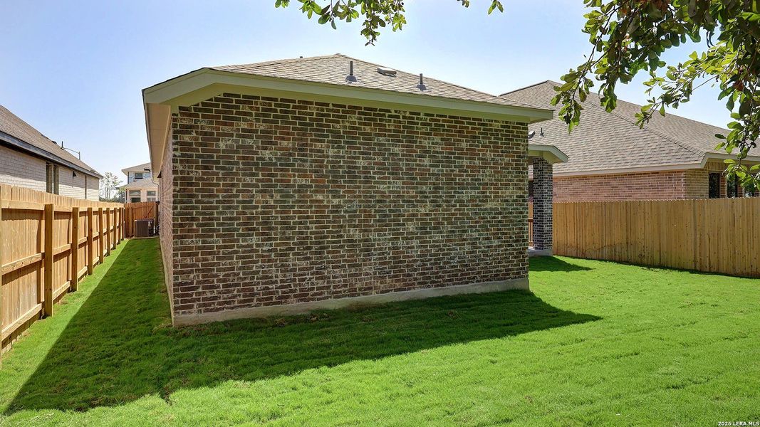 Exterior details and patio area of a home in Kallison Ranch, San Antonio (Image 24).