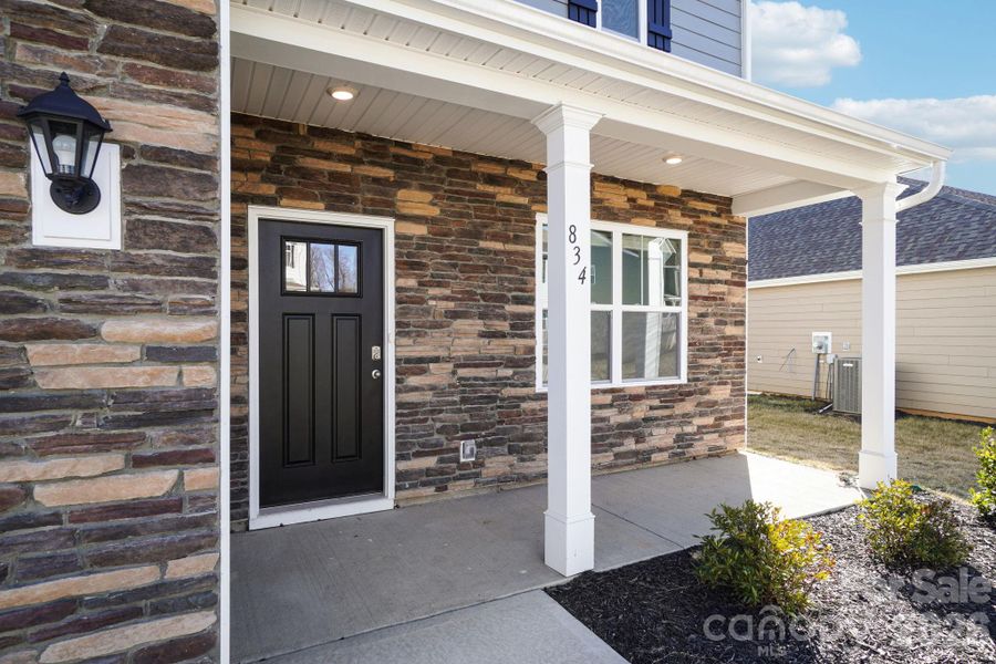 Exterior details and patio area of a home in Rydele Heights, Asheville (Image 20).
