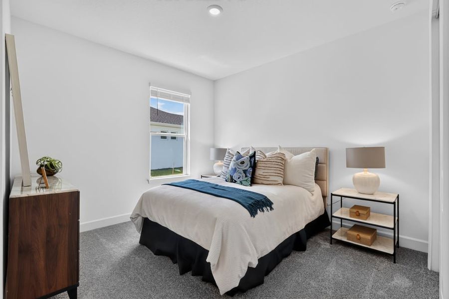 Representative furnished interior of a home built from the Abaco by Taylor Morrison in Ardisia Park, New Smyrna Beach (Image 21).