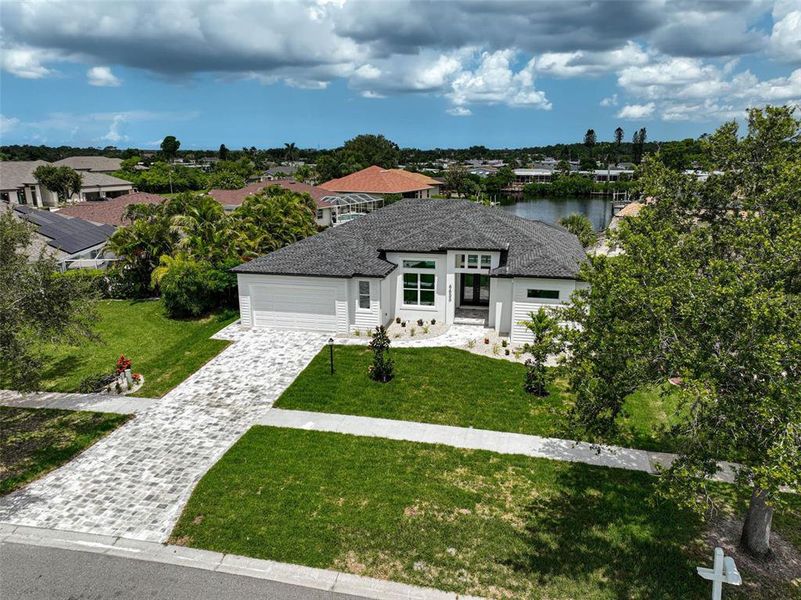 Front exterior of a new home in , North Port, FL, highlighting curb appeal (Image 35).