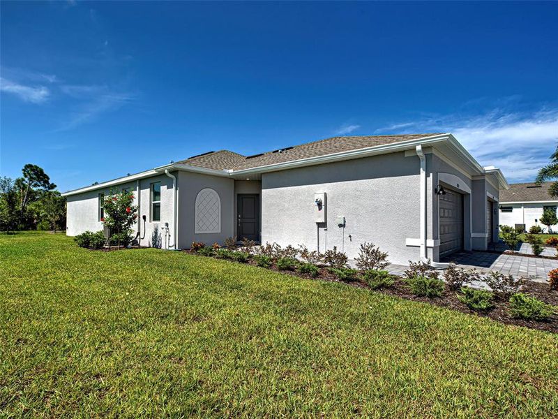 Front exterior of a new home in , Englewood, FL, highlighting curb appeal (Image 20).