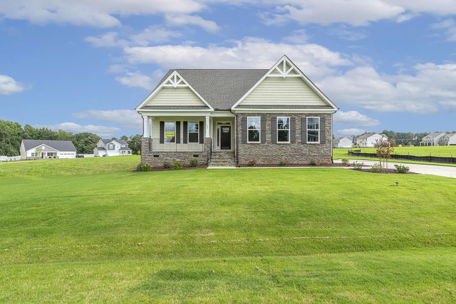 Front exterior of a new home in Berea Farms, Four Oaks, NC, highlighting curb appeal (Image 2).