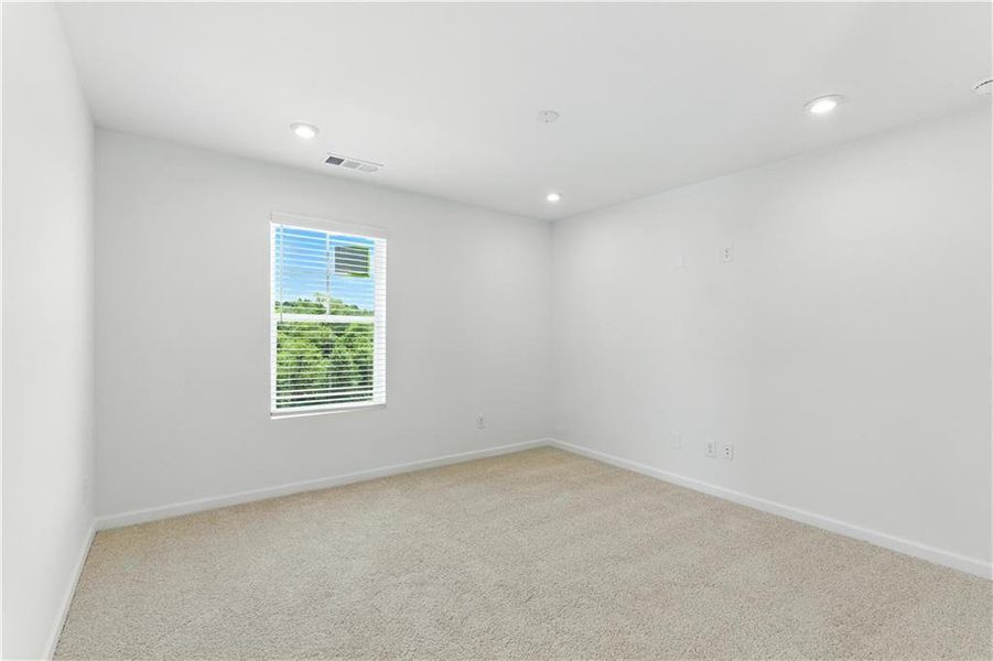 Spacious, unfurnished interior of a new home in The View at Groover’s Lake, Lithia Springs (Image 10).