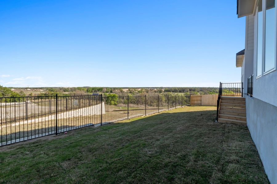 Exterior details and patio area of a home in Lariat, Liberty Hill (Image 3).