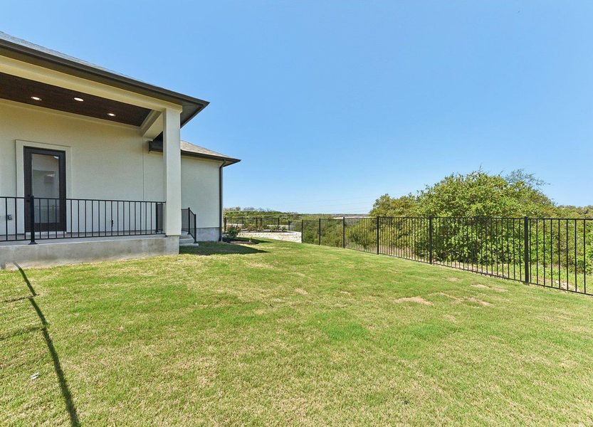 View of yard featuring fence View of yard featuring fence