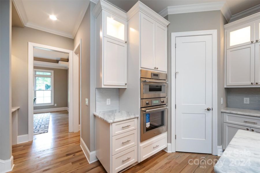 Kitchen Photo is a representation of builders work on Completion of Home Next Door