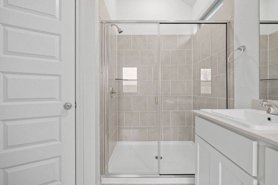 Primary Bath in the Birch home plan by Trophy Signature Homes – REPRESENTATIVE PHOTO
